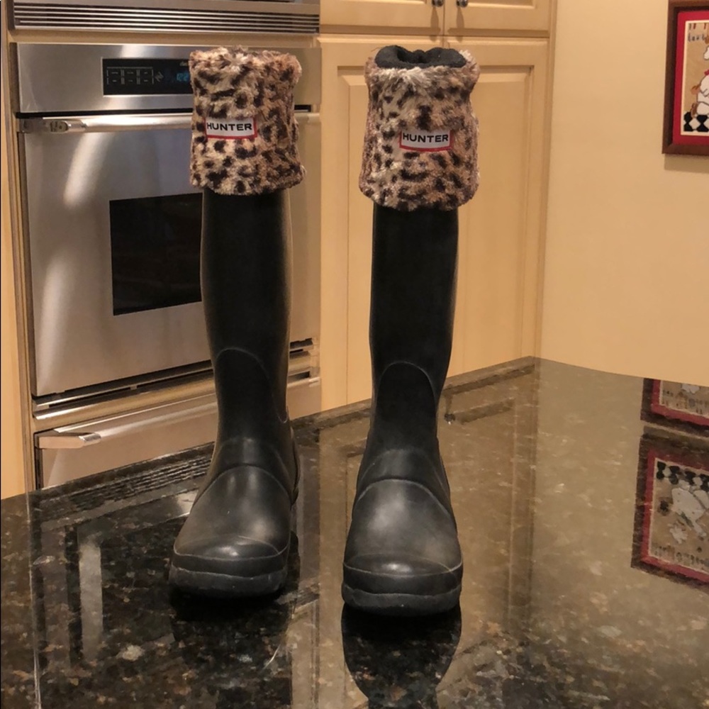 Tall Hunter Boots with leopard inserts.
